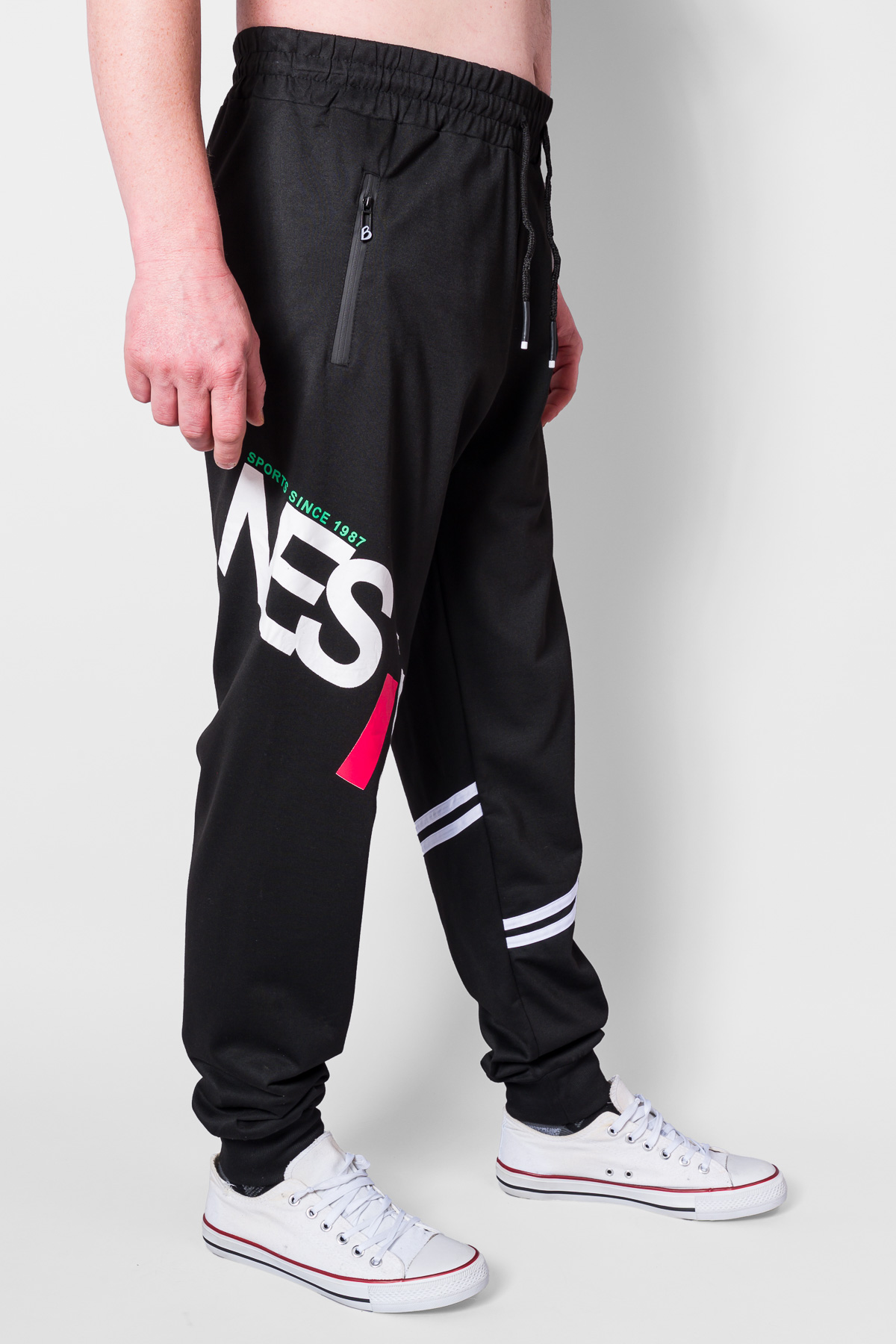 Pánske tepláky SPORT SINCE 1987 - čierne/zelené