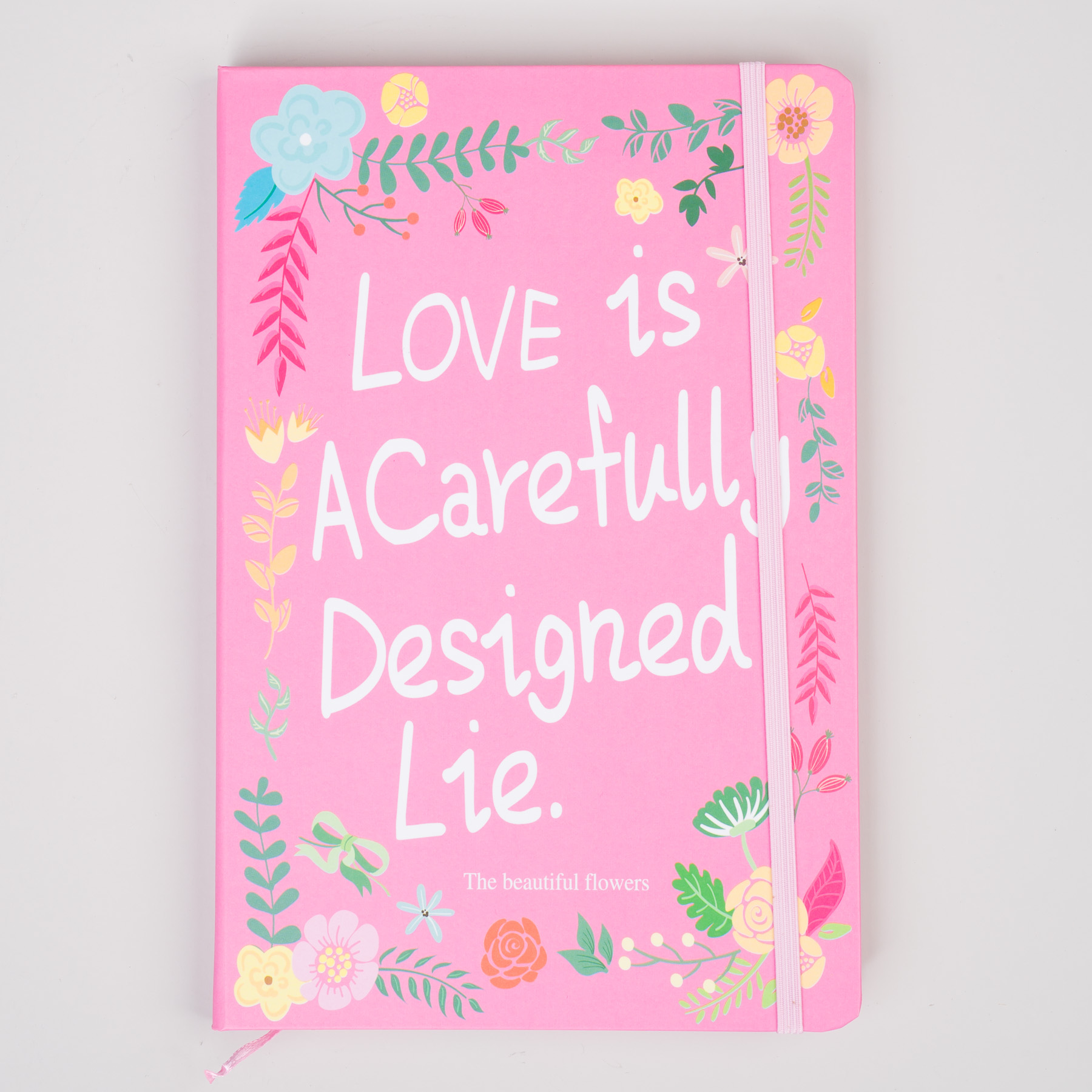 Notesz LOVE IS A CAREFULLY DESIGNED LIE - rózsaszín