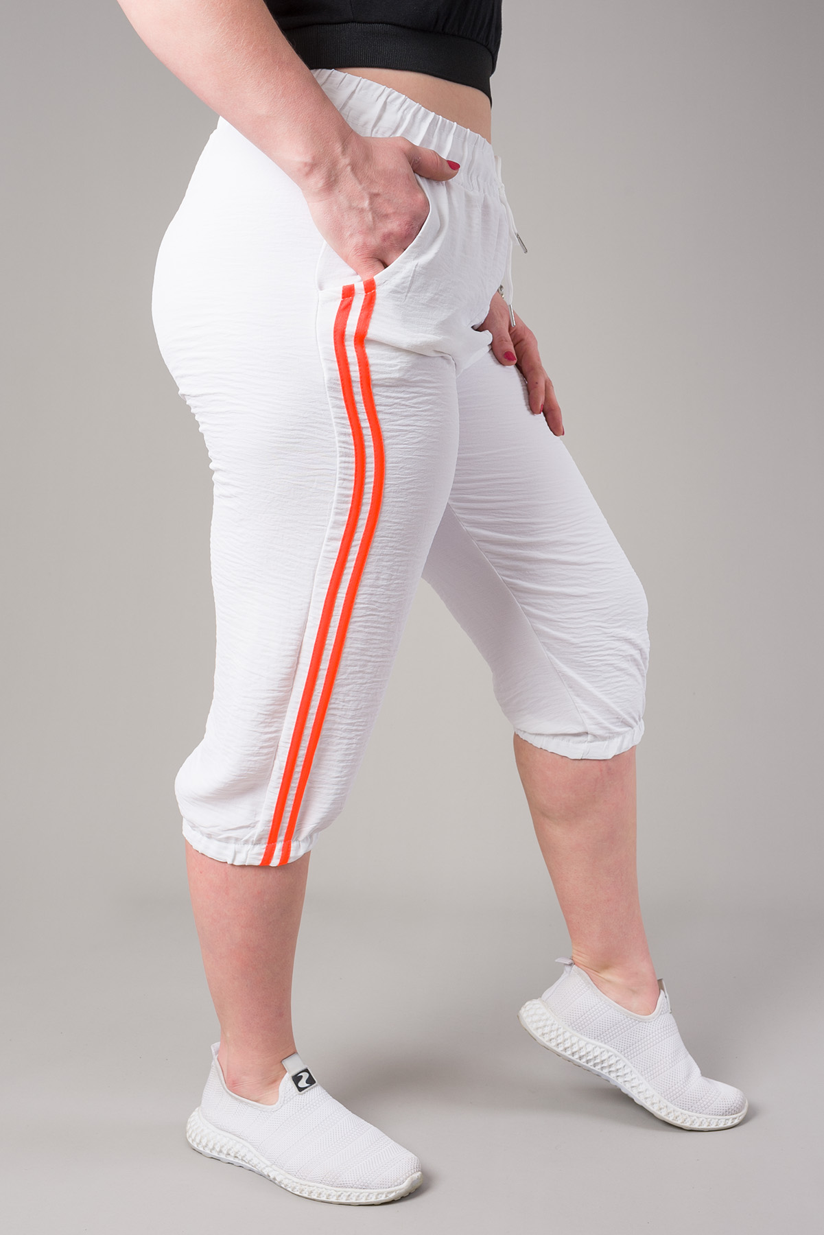 Dámske capri nohavice KIND - biele/oranžové